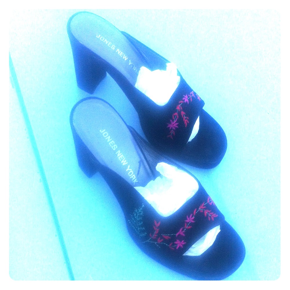 Black suede mule.